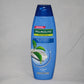 Palmolive shampoo bottle on a gray background